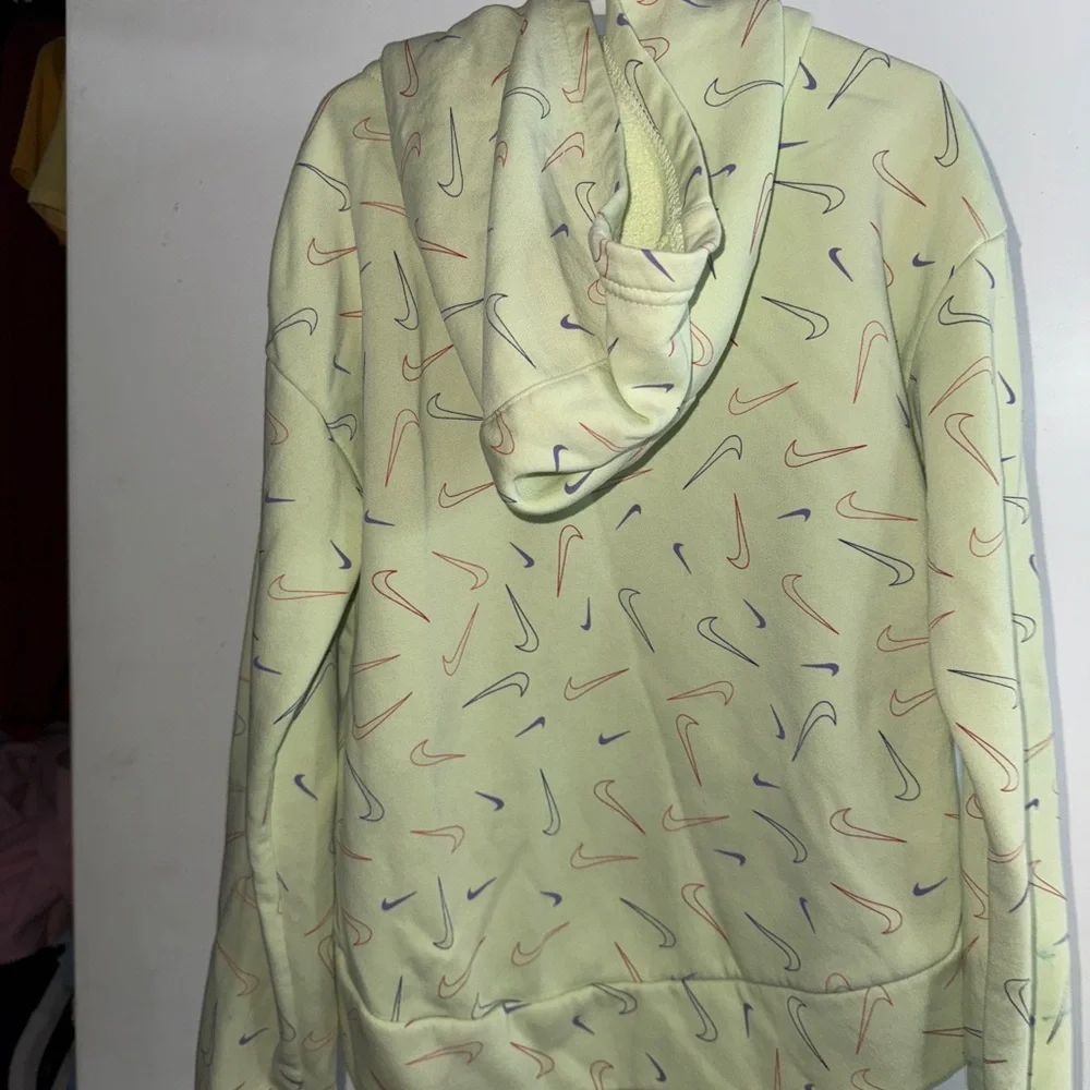 2/$15 Nike Green Hoodie with Multicolor Swoosh Pattern, minor stains